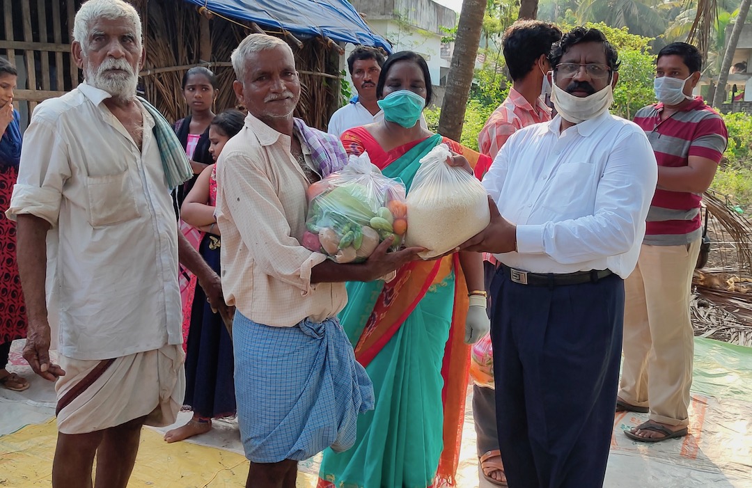 India - Bags of fruit, vegetables and rice have been handed out to families who have no income.