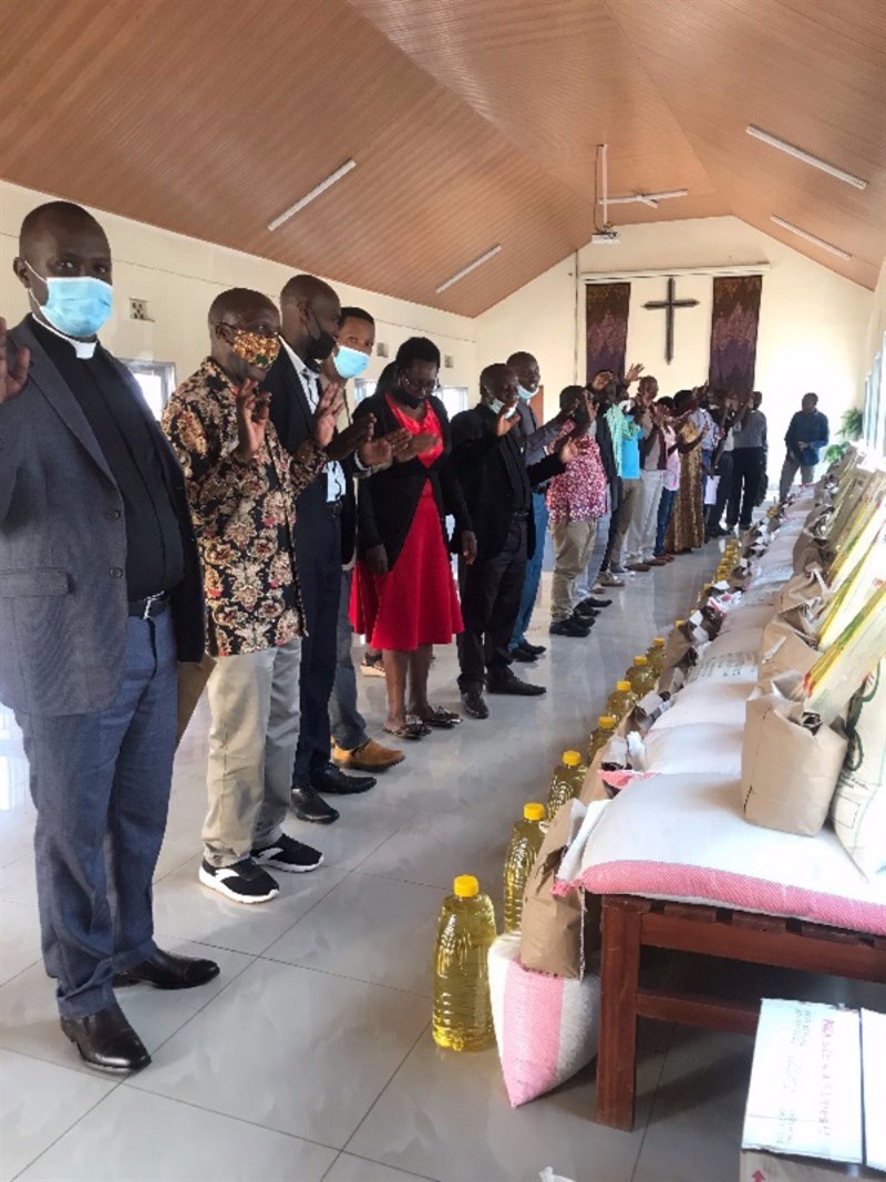 Pastors in Gasabo Diocese receive essential provisions given by DT. 