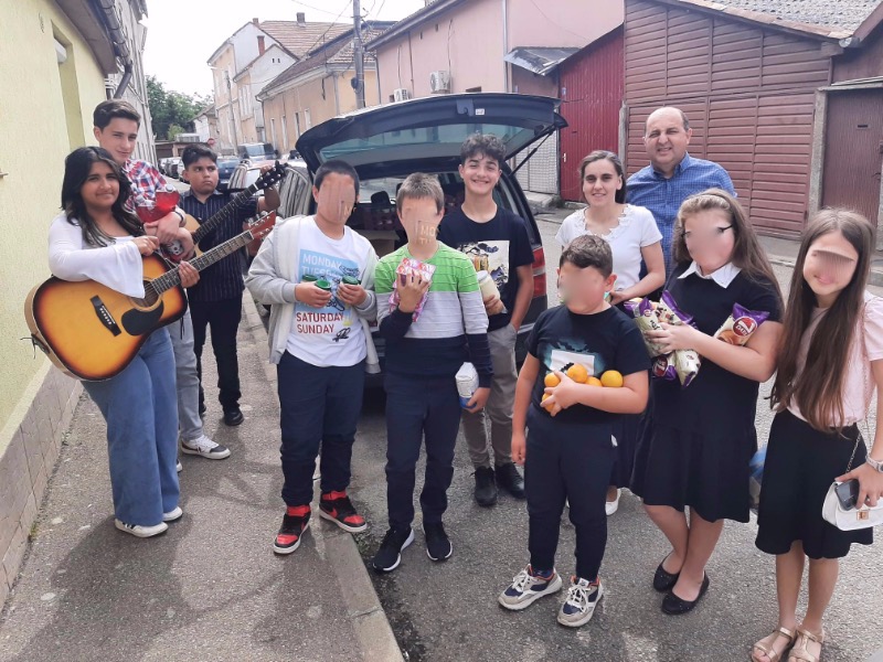 ACV Guitar class with food parcels to distribute to families in need.