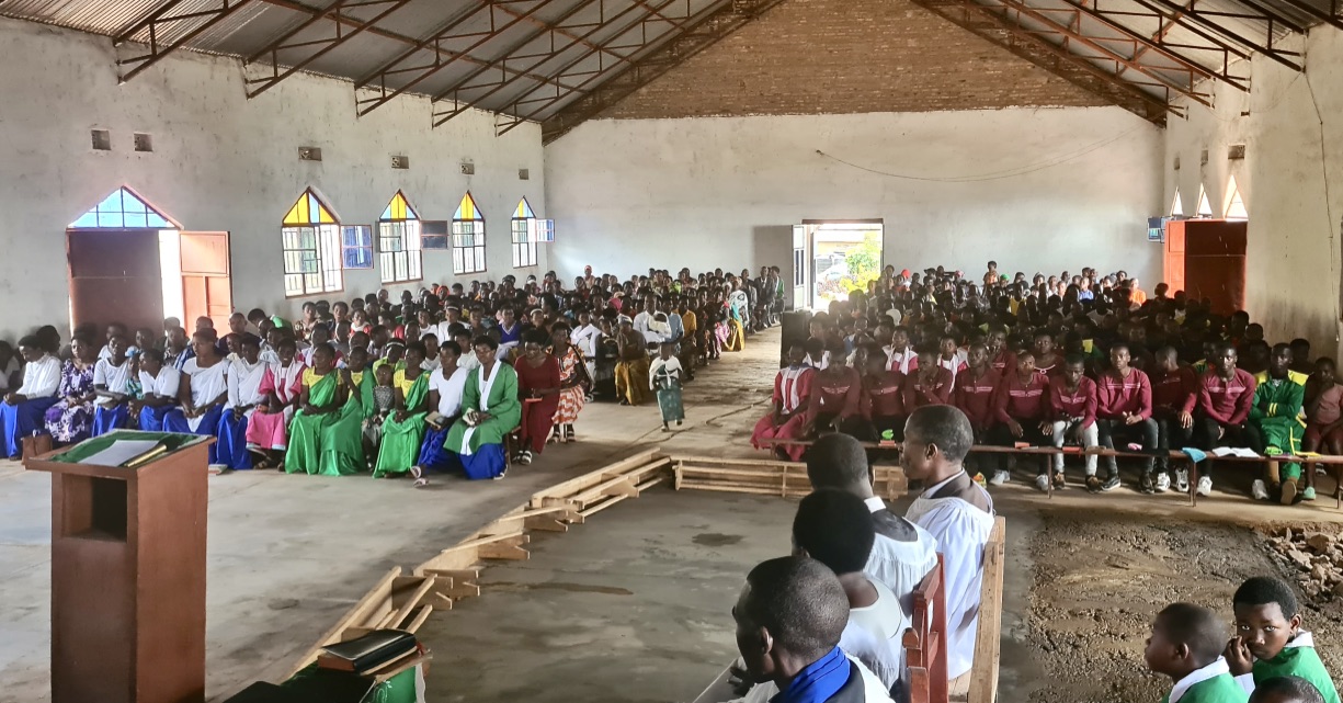 Sunday morning congregation at Nyabihu parish. Concrete floor in the foreground was still drying out!