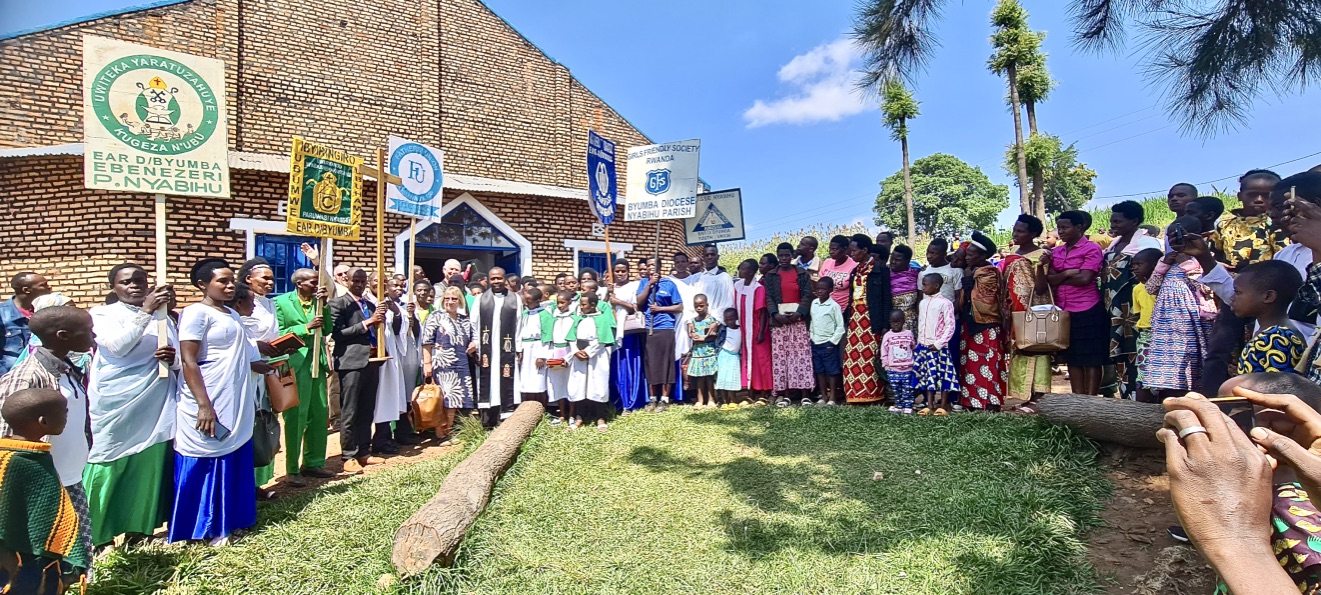 Nyabihu congregation - group photo. Banners are for the different activity groups.