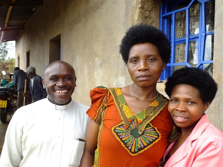 Pastor Emmanuel, his wife and daughter at Gitove parish in Byumba diocese